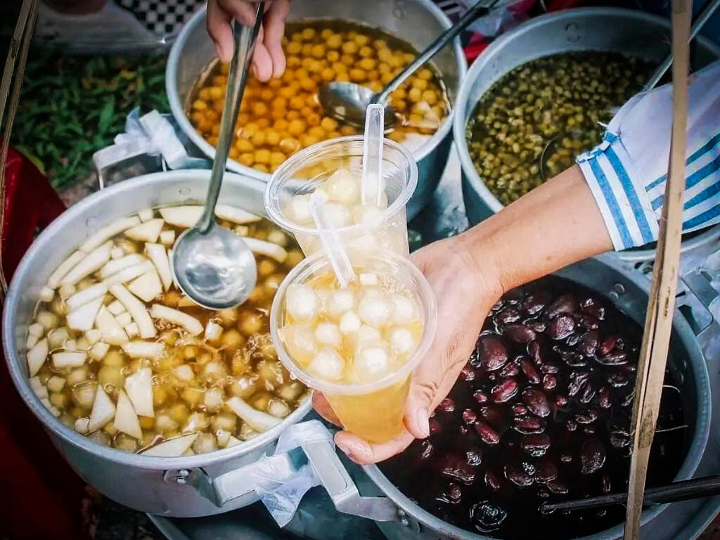 Savor sweet flavors with friends on a Hue food tour